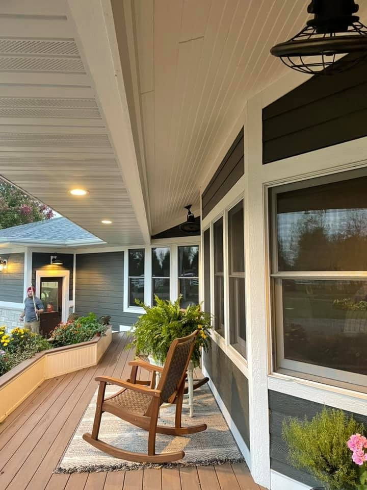 Covered porch with planter boxes and composite decking