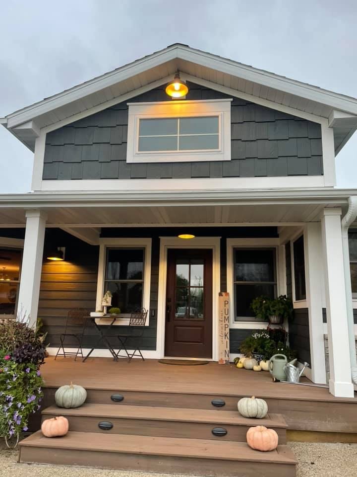 Craftsman front porch with columns and shake gable